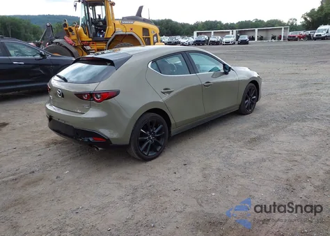 2024 Mazda Mazda3 Hatchback 2.5 Carbon Turbo from USA, damaged, VIN JM1BPBYY6R1704673